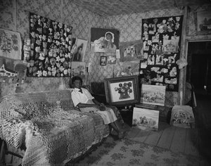 The World Of A Primitive Painter, Number Two. Clementine Hunter At Home — Clarence John Laughlin