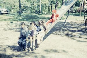 Six children on a slide