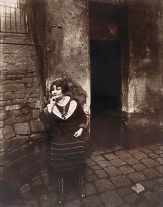 La Villette. Rue Asselin, Prostitute Waiting In Front Of Her Door — Eugène Atget