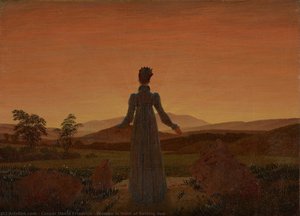 Frau vor Sonnenuntergang