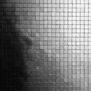 Monolithic Grayscale Symmetry: A Meditative Study In Infinite Light And Shadow — David Moreau