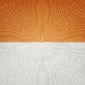 Ätherische Resonanz In Ocker Und Stein: Ein Meditativer Geometrischer Monolith