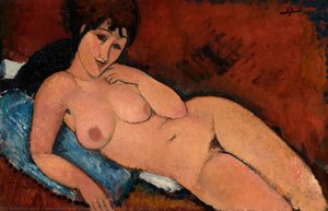 Desnudo sobre un cojín azul